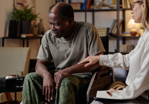 Traumatized African American Soldier with PTSD at Private Therapy Session